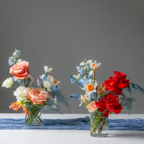 Small Glass Vase arrangement. Two small flower arrangements using roses and daffodils in a glass vase.