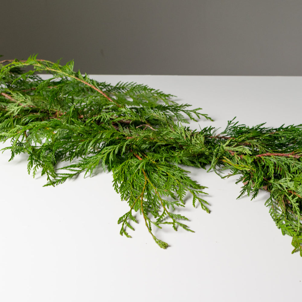 Cedar branches woven into a garland.