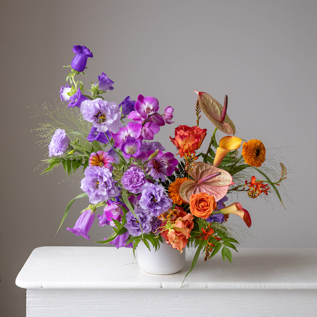 Subtle fresh flower arrangement in pastel & muted neutral colours