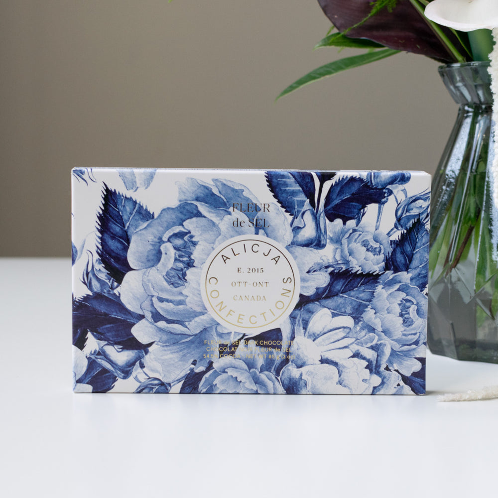 Dark chocolate bar in a blue box. 